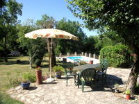 Attractive patio with shade from trees